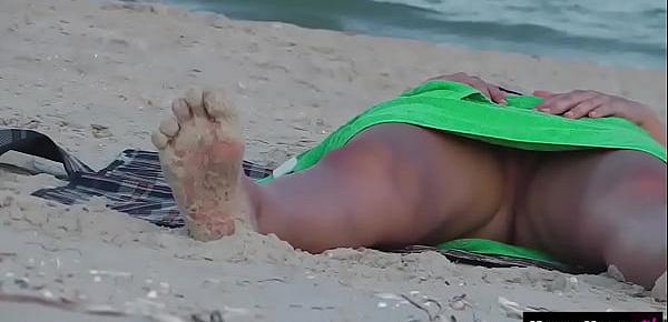  Voyeur hidden cam -  Girl on a nude beach in Italy!